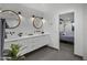 Modern bathroom with double vanities and stylish design at 8409 E Clarendon Ave, Scottsdale, AZ 85251