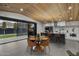 Eat-in kitchen, connected to the patio, boasts modern design and finishes at 8409 E Clarendon Ave, Scottsdale, AZ 85251