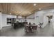 Eat in kitchen features modern finishes and a black kitchen island with barstool seating at 8409 E Clarendon Ave, Scottsdale, AZ 85251