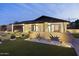 Beautiful modern home showcasing desert landscaping, a walkway, and eye-catching curb appeal at 8409 E Clarendon Ave, Scottsdale, AZ 85251