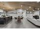 This open-concept kitchen connects to the dining and living area for flexible everyday living at 8409 E Clarendon Ave, Scottsdale, AZ 85251