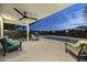 Covered patio and pool area are great for outdoor entertaining and relaxing at 8409 E Clarendon Ave, Scottsdale, AZ 85251