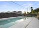 Backyard pool and patio area, perfect for enjoying the outdoors and soaking up the sun at 8409 E Clarendon Ave, Scottsdale, AZ 85251