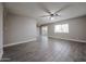 Spacious living room with tile floors and ample natural light from the large window at 10411 N 11Th Ave # 28, Phoenix, AZ 85021