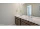 Bathroom featuring a double vanity with modern fixtures and spacious countertop at 11051 E Ulysses Ave, Mesa, AZ 85212