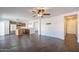 Hard surface floors lead to an open floor plan, combining kitchen and living areas at 1202 W Central Ave, Coolidge, AZ 85128