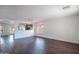 Open-concept living area with hard surface floors, neutral tones, and plenty of natural light at 1202 W Central Ave, Coolidge, AZ 85128