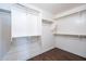 Walk-in closet featuring wood-look floors and shelving at 1202 W Central Ave, Coolidge, AZ 85128