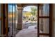 Inviting front entrance with stone pathway and desert landscaping at 12083 E Wethersfield Dr, Scottsdale, AZ 85259