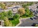 Scenic aerial view of townhomes with mature trees, green lawns, and convenient parking in a well-kept community at 1222 W Baseline Rd # 116, Tempe, AZ 85283