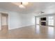 Bright living room with a cozy fireplace and neutral tile flooring at 1222 W Baseline Rd # 116, Tempe, AZ 85283