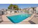 Community pool area with a relaxing hot tub and lounge chairs, perfect for enjoying sunny days and recreation at 1222 W Baseline Rd # 116, Tempe, AZ 85283