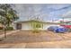 Charming single-story home with xeriscaped yard, mature trees, and a welcoming entrance at 1340 E Townley Ave, Phoenix, AZ 85020