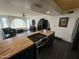 Updated kitchen with butcher block countertop and stainless steel gas cooktop at 1340 E Townley Ave, Phoenix, AZ 85020