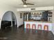 Open kitchen design with butcher block countertops and bar seating at 1340 E Townley Ave, Phoenix, AZ 85020