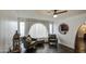 Cozy living room featuring two comfortable armchairs, side table, and plenty of natural light at 1340 E Townley Ave, Phoenix, AZ 85020