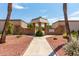 Exterior shot of a walkway with a gazebo and decorative landscaping on a sunny day at 13677 N 108Th Dr, Sun City, AZ 85351