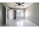 Bedroom with tile flooring, a ceiling fan, and a closet at 1432 W Emerald Ave # 712, Mesa, AZ 85202