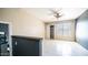 Bright living room featuring tile flooring, a ceiling fan, and natural light from a window at 1432 W Emerald Ave # 712, Mesa, AZ 85202