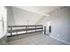 Open loft space with tile floor, updated railing, and views to below at 1432 W Emerald Ave # 712, Mesa, AZ 85202