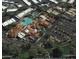 Aerial view of a community clubhouse, pool area, and amenities showcasing the layout of the community at 14385 W Morning Star Trl, Surprise, AZ 85374