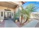 Welcoming front entrance with security doors and an inviting approach to this charming home at 14385 W Morning Star Trl, Surprise, AZ 85374