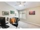 Bright home office space with natural light from the window and neutral wall colors at 14385 W Morning Star Trl, Surprise, AZ 85374