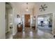 Inviting foyer with high ceilings, stylish decor, and a grand wooden front door at 1440 W Christie Lyn Ln, San Tan Valley, AZ 85144