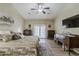 Spacious main bedroom featuring neutral paint, decorative furnishings, and backyard access at 1440 W Christie Lyn Ln, San Tan Valley, AZ 85144