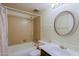 Cozy bathroom featuring a tub-shower combo, large mirror and efficient fixtures at 14620 N Yerba Buena Way # D, Fountain Hills, AZ 85268