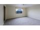 Bedroom with new carpet and a window offering scenic views of the surrounding landscape at 14620 N Yerba Buena Way # D, Fountain Hills, AZ 85268