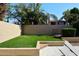 Private backyard featuring lush artificial grass, perfect for recreation and relaxation at 15273 N 92Nd Pl, Scottsdale, AZ 85260