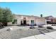 Charming single-story home with well-maintained landscaping and a tile roof in a desirable neighborhood at 15273 N 92Nd Pl, Scottsdale, AZ 85260