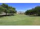 Community park grassy area with shade covering and mountain view at 15273 N 92Nd Pl, Scottsdale, AZ 85260