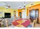 Bright dining room adjacent to the living area, perfect for entertaining and Gathering meals at 15840 W Falcon Ridge Dr, Sun City West, AZ 85375