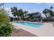 Outdoor swimming pool with lounge chairs and well-maintained landscaping at 16807 E Gunsight Dr # B18, Fountain Hills, AZ 85268