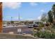 Inviting street view showcasing desert landscaping, nearby shopping, and a beautiful local fountain at 16807 E Gunsight Dr # B18, Fountain Hills, AZ 85268