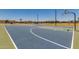 Community basketball court featuring well-maintained court surface and adjustable hoops at 16939 W Marconi Ave, Surprise, AZ 85388