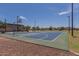 Neighborhood basketball court featuring a full court, adjustable hoops, and benches at 16939 W Marconi Ave, Surprise, AZ 85388