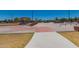 Community skate park with smooth concrete surfaces and various ramps for skateboarders at 16939 W Marconi Ave, Surprise, AZ 85388