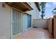 Private patio area featuring tiled floor and access to the home via a sliding glass door at 17031 E Calle Del Oro -- # B, Fountain Hills, AZ 85268