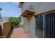 Private patio area with tiled floor and orange tree, offering a cozy outdoor space at 17031 E Calle Del Oro -- # B, Fountain Hills, AZ 85268