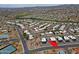 Overhead shot of a neighborhood featuring tree-lined streets and community pool at 17056 E Calle Del Oro Dr # B, Fountain Hills, AZ 85268