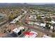 Aerial view of neighborhood showcasing the layout of homes and mature landscaping at 17056 E Calle Del Oro Dr # B, Fountain Hills, AZ 85268