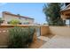 Private backyard with block fence and desert landscaping at 17056 E Calle Del Oro Dr # B, Fountain Hills, AZ 85268