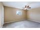 Neutral bedroom with a ceiling fan, window, plush carpeting, and natural light at 17056 E Calle Del Oro Dr # B, Fountain Hills, AZ 85268