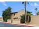 Inviting two-story townhouse with desert landscaping and mature palm trees for relaxed curb appeal at 17056 E Calle Del Oro Dr # B, Fountain Hills, AZ 85268