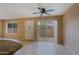 Bright living room featuring neutral walls, tile flooring, and sliding glass doors at 17056 E Calle Del Oro Dr # B, Fountain Hills, AZ 85268