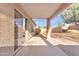 Covered back patio with view of the backyard, creating an inviting outdoor space at 1715 E Branham Ln, Phoenix, AZ 85042