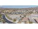 Aerial view of a desert community neighborhood close to schools, shopping and mountain views at 17796 W Sandy Rd, Goodyear, AZ 85338